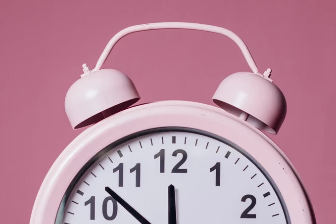 Pink and White Alarm Clock